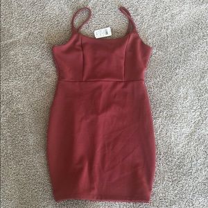 Dusty rose bodycon dress.